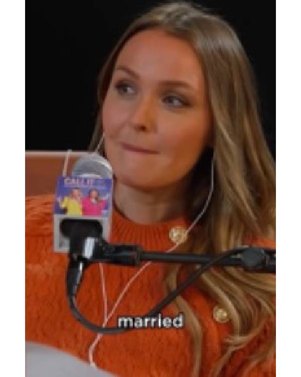 Call It What It Is Camilla Luddington Orange Sweater